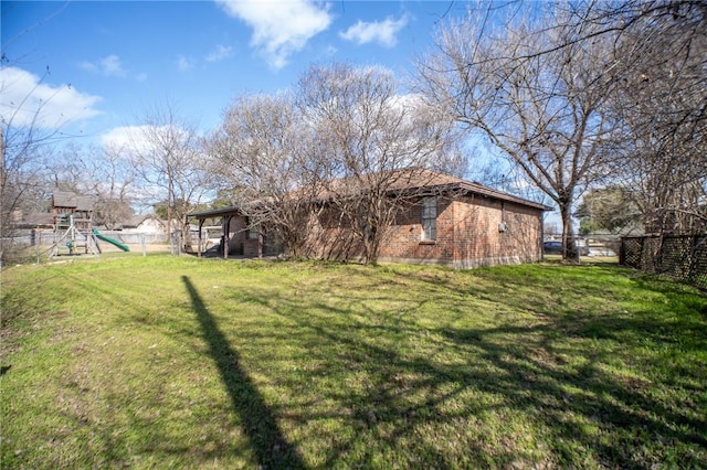 view of yard featuring a playground