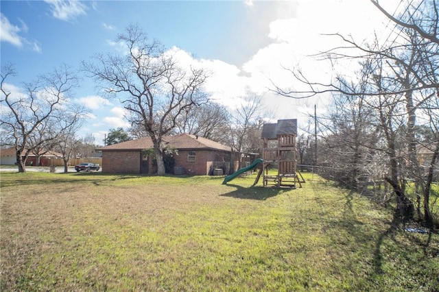 view of yard featuring a playground