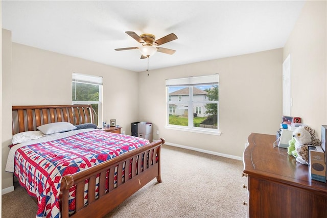 3807 Meadow View Dr, College Station, TX 77845 - carpeted bedroom featuring baseboards and a ceiling fan