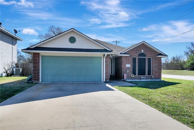 ranch-style home with central air condition unit, a front yard, and a garage