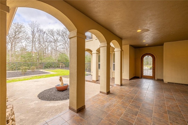 view of patio featuring fence