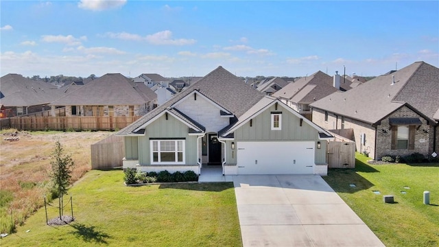 view of front of house with a garage and a front yard