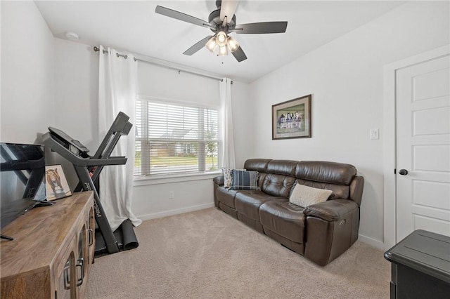 interior space featuring ceiling fan and light carpet