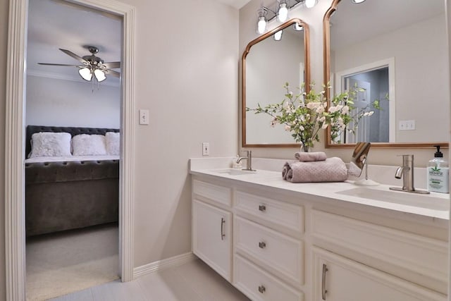 bathroom with ceiling fan, vanity, and tile patterned floors