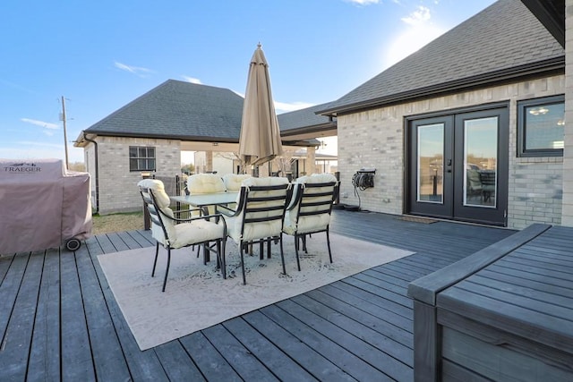 deck featuring area for grilling and french doors