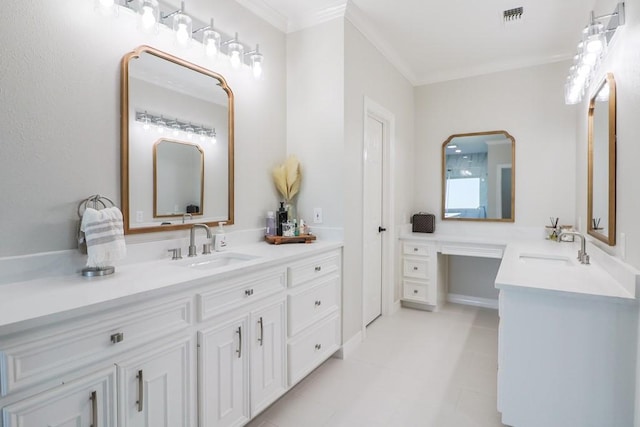 bathroom with vanity and ornamental molding