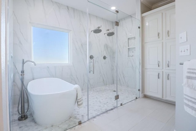 bathroom featuring separate shower and tub