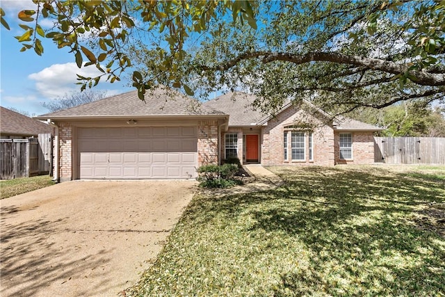 ranch-style home featuring fence, driveway, a shingled roof, a front lawn, and a garage