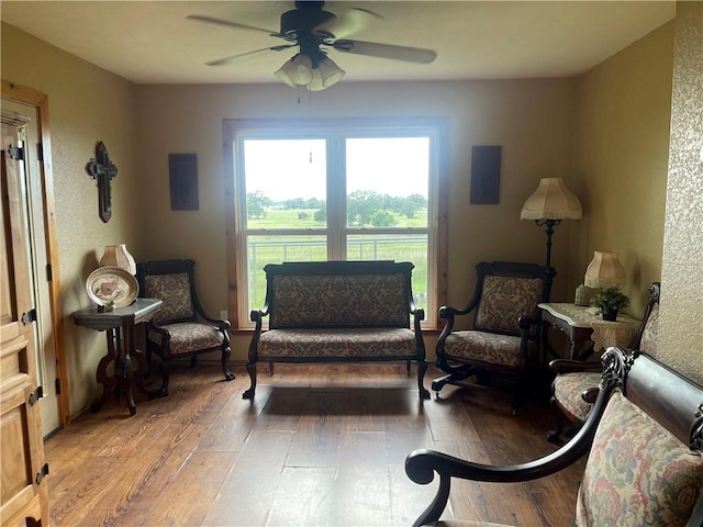 16659 Hwy 90 N, Bedias, TX 77831 - sitting room with a ceiling fan and wood finished floors