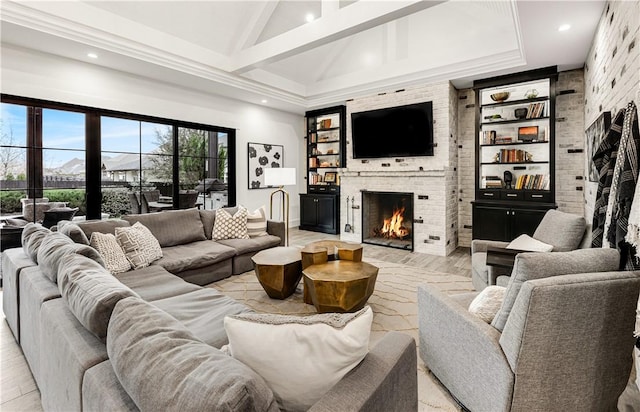 living room featuring a fireplace, recessed lighting, light wood-style floors, brick wall, and high vaulted ceiling