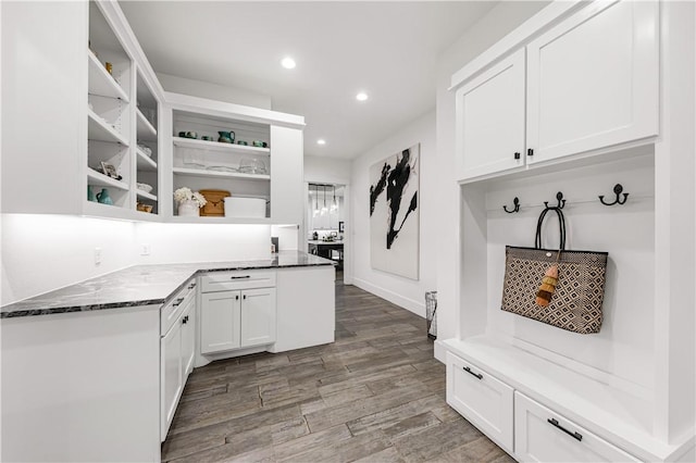 mudroom featuring light wood-style floors, recessed lighting, and baseboards