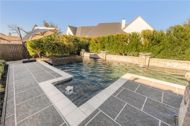 view of pool featuring fence and a fenced in pool