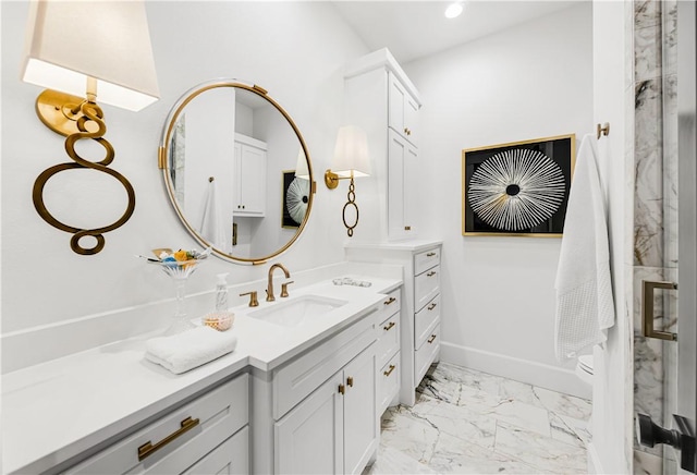 bathroom with a stall shower, baseboards, marble finish floor, vanity, and recessed lighting