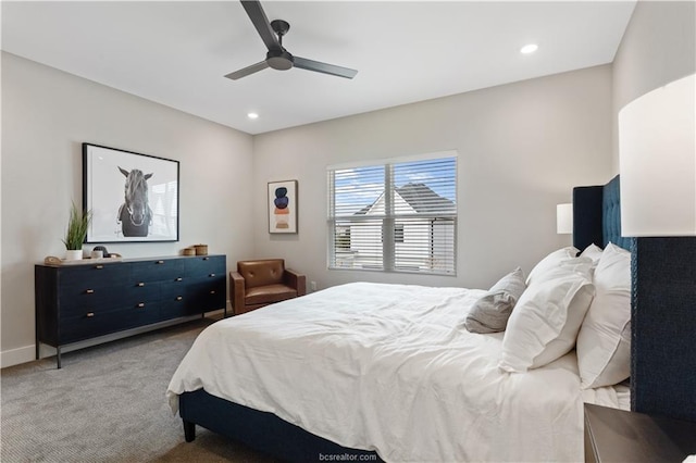 carpeted bedroom featuring a ceiling fan, baseboards, and recessed lighting