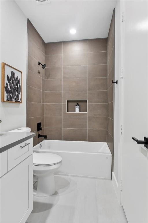 242 Estates Cir, College Station, TX 77840 - full bath featuring tile patterned floors, bathtub / shower combination, toilet, vanity, and recessed lighting