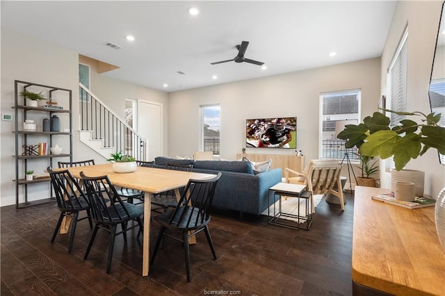 dining room featuring a ceiling fan, recessed lighting, visible vents, dark wood-style floors, and stairway