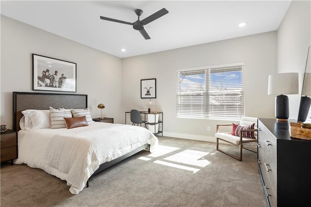 bedroom with recessed lighting, baseboards, light colored carpet, and ceiling fan