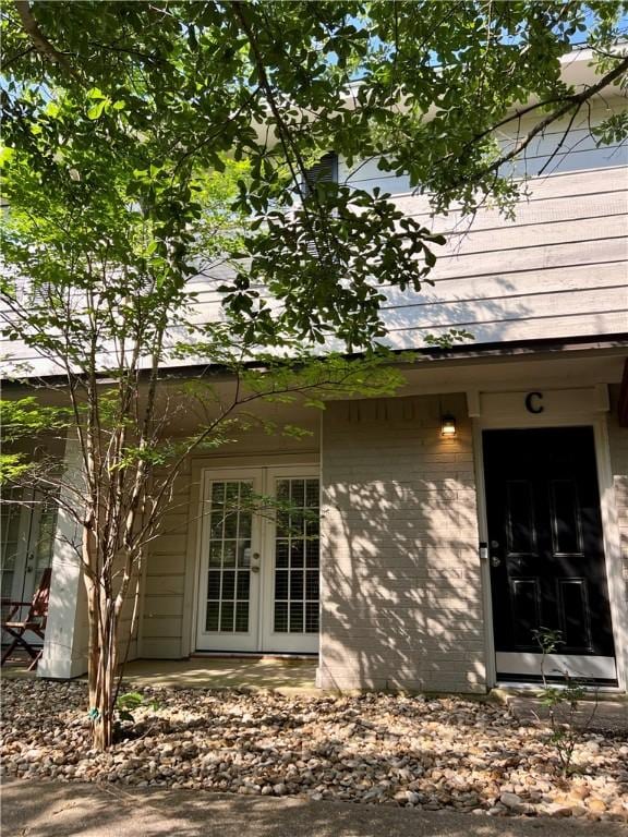 property entrance with french doors