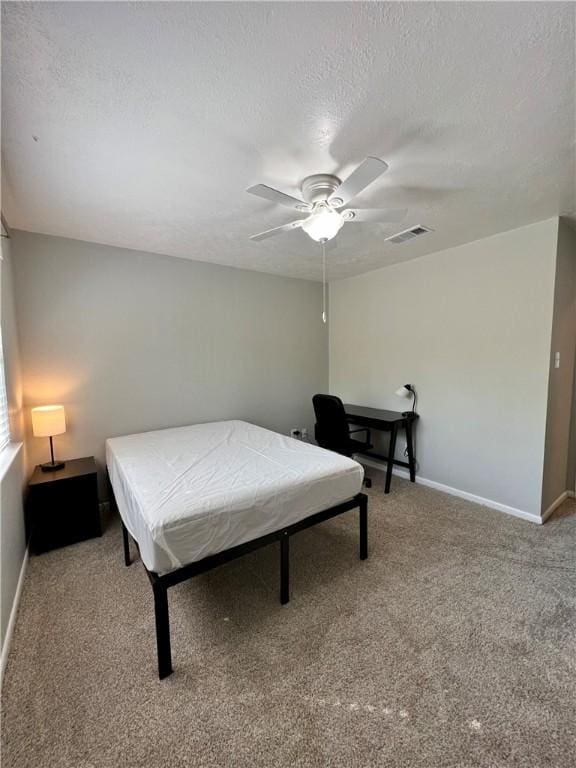 bedroom featuring a textured ceiling, ceiling fan, billiards, and carpet