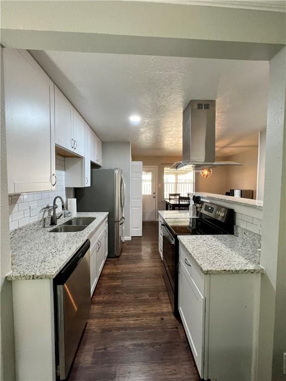 kitchen featuring sink, white cabinetry, stainless steel dishwasher, black / electric stove, and island range hood