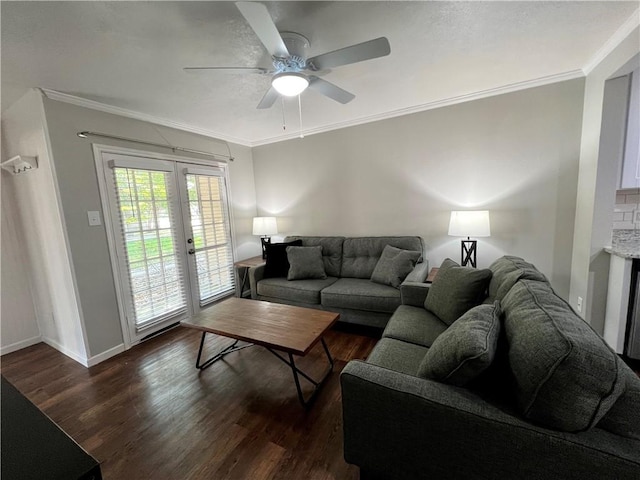 living room featuring french doors, ornamental molding, and dark hardwood / wood-style floors