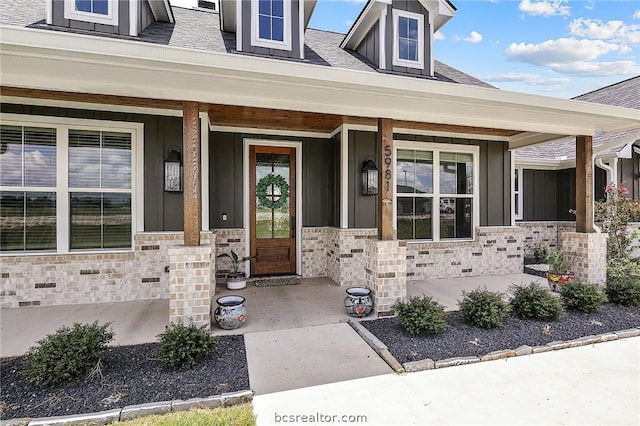 doorway to property with covered porch