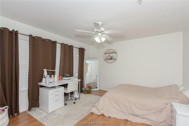 bedroom featuring ceiling fan and light hardwood / wood-style flooring