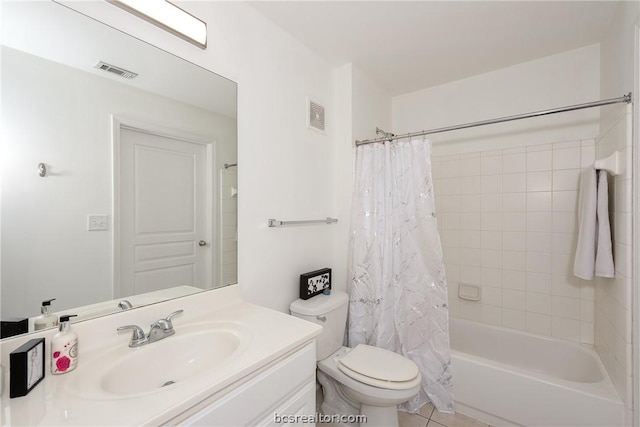 full bathroom featuring tile patterned floors, vanity, shower / bath combination with curtain, and toilet