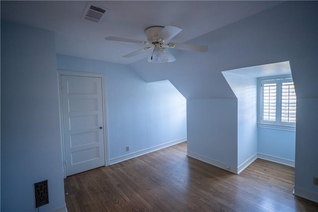 bonus room featuring ceiling fan, dark hardwood / wood-style flooring, and vaulted ceiling