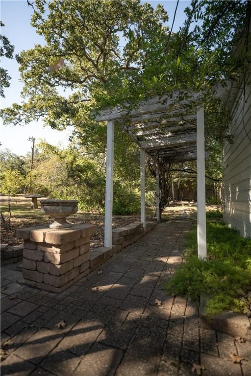 view of patio / terrace featuring a pergola