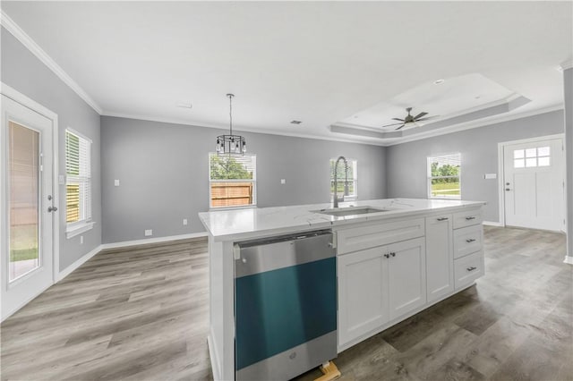611 Levy St, Navasota, TX 77868 - kitchen featuring dishwasher, a sink, crown molding, light wood-type flooring, and white cabinets