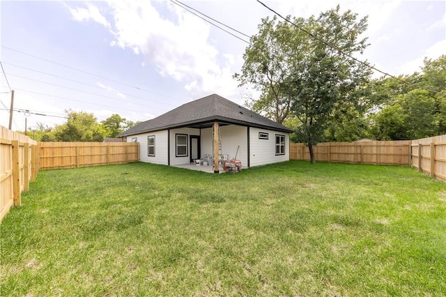 611 Levy St, Navasota, TX 77868 - rear view of house featuring a patio area