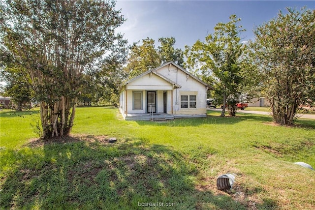 view of front of home featuring a porch and a front yard