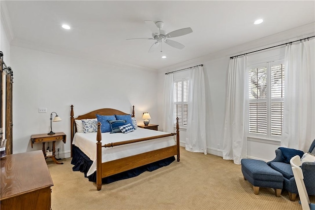 bedroom with light carpet, ornamental molding, a barn door, and ceiling fan