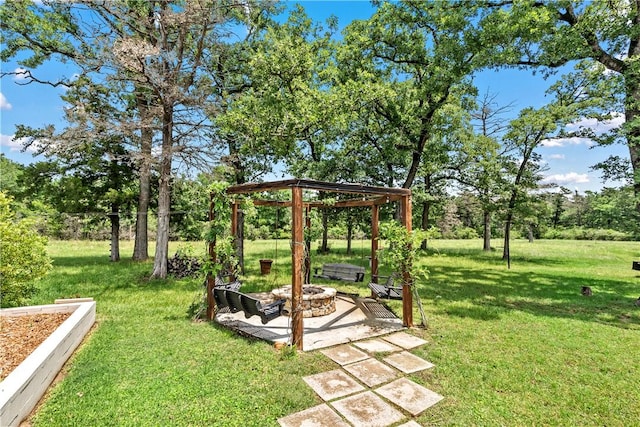 view of yard with an outdoor fire pit and a gazebo