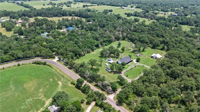 bird's eye view featuring a forest view