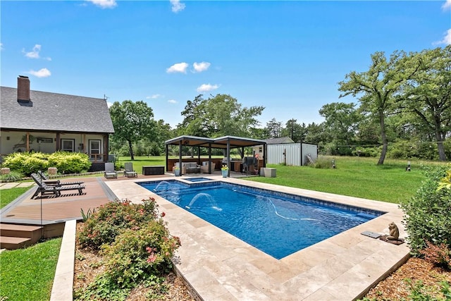 pool with a gazebo, a yard, a shed, an outbuilding, and an in ground hot tub