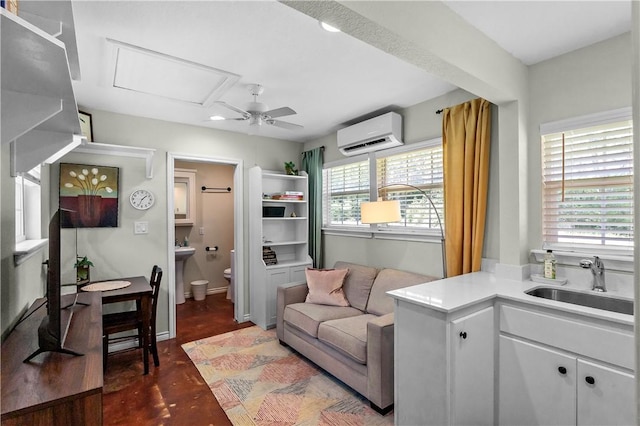 living room featuring a ceiling fan, finished concrete flooring, and a wall mounted AC