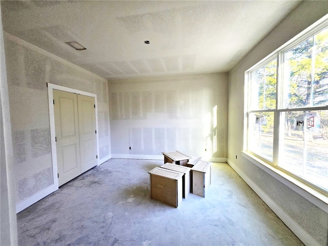 interior space with concrete flooring