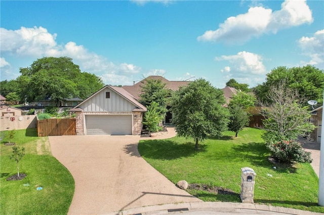 2915 Alba Ct, Bryan, TX 77808 - view of front facade featuring board and batten siding, concrete driveway, an attached garage, and brick siding