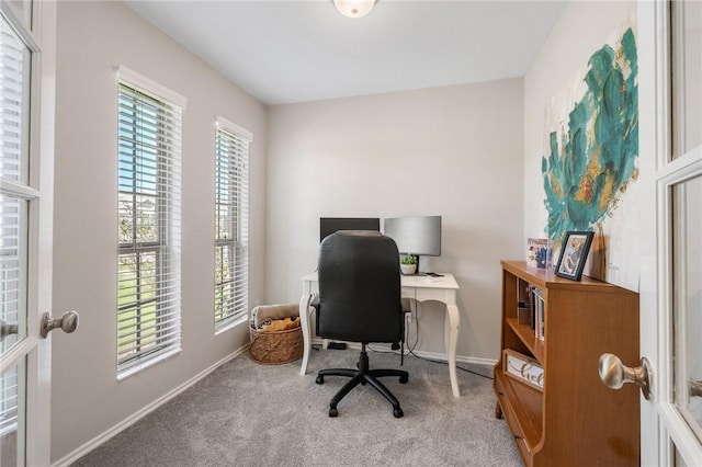 office with carpet flooring and baseboards