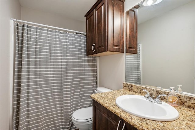 full bath with vanity and toilet