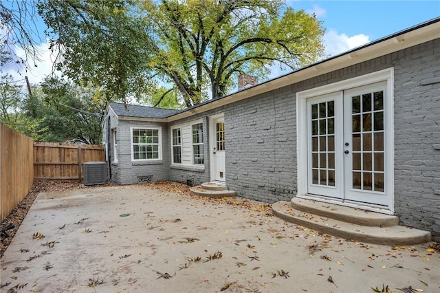 exterior space featuring french doors, a patio, and central air condition unit