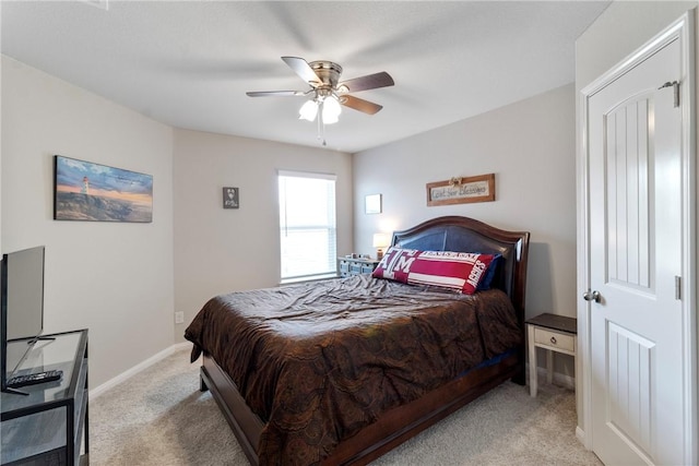 974 Marquis Dr, Bryan, TX 77803 - bedroom with light colored carpet and a ceiling fan