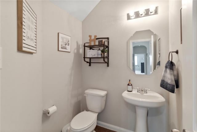 974 Marquis Dr, Bryan, TX 77803 - half bath with toilet and vaulted ceiling