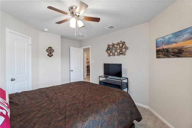 974 Marquis Dr, Bryan, TX 77803 - carpeted bedroom featuring baseboards and ceiling fan