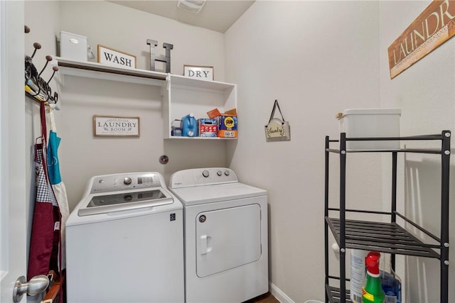 974 Marquis Dr, Bryan, TX 77803 - washroom featuring independent washer and dryer and baseboards