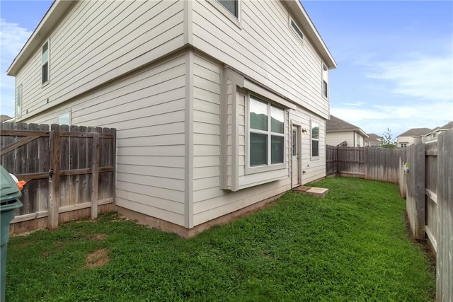 974 Marquis Dr, Bryan, TX 77803 - view of home's exterior featuring a fenced backyard