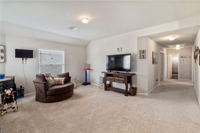 974 Marquis Dr, Bryan, TX 77803 - carpeted living area with attic access and vaulted ceiling