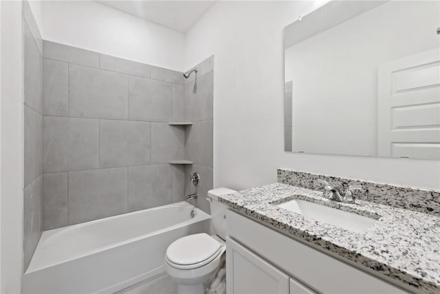 full bath with toilet, vanity, and bathing tub / shower combination